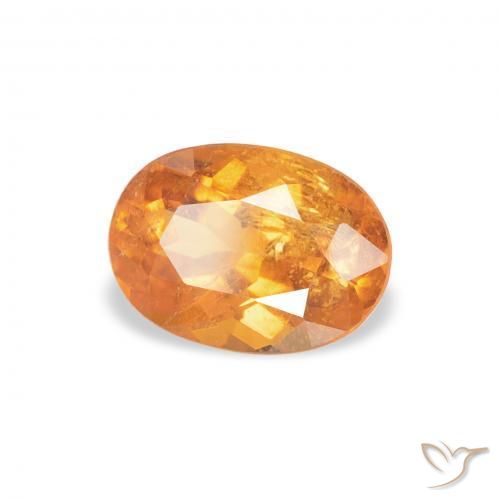 Clinoumite Arancio Medio naturale da 0.87 ct, Ovale, SI