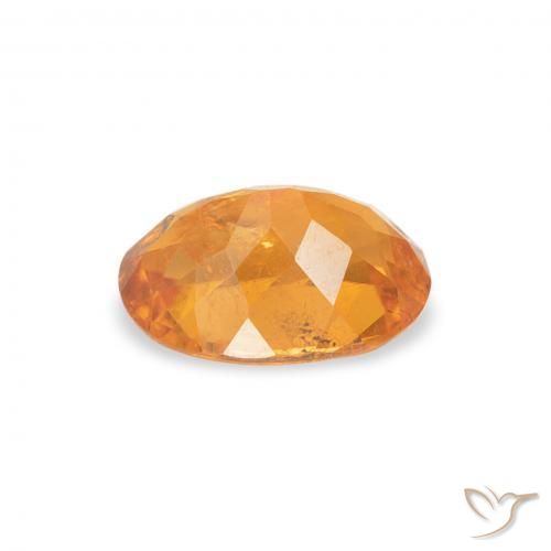 Clinoumite Arancio Medio naturale da 0.87 ct, Ovale, SI