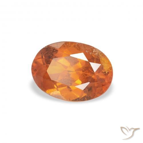 Clinoumite Arancione scuro naturale da 0.89 ct, Ovale, SI