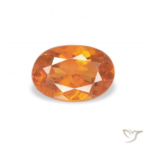 0.57ct Naturale Arancio Medio Clinoumite, Ovale, SI