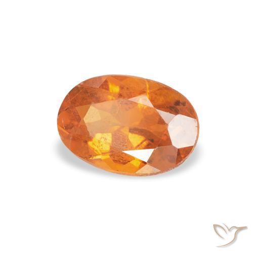 Clinoumite Arancio Medio naturale da 0.57 ct, Ovale, SI