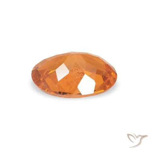 Clinoumite Arancio Medio naturale da 0.57 ct, Ovale, SI
