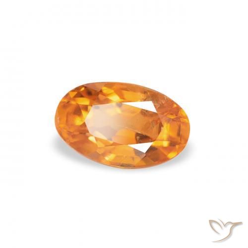 Clinoumite Arancione Ambra naturale da 0.40 ct, Ovale, SI