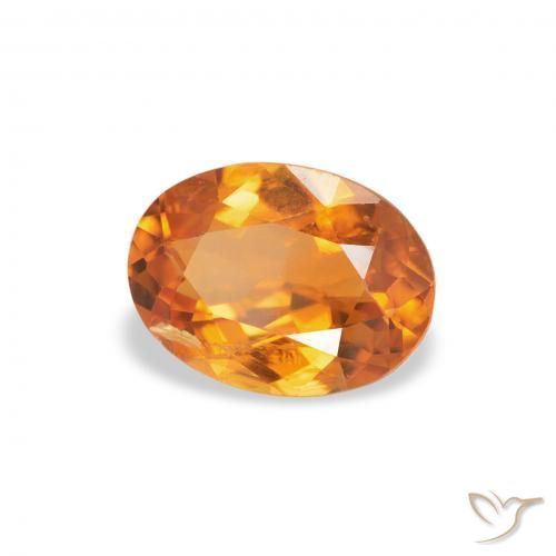 Clinoumite Albicocca Arancia naturale da 0.70 ct, Ovale, SI