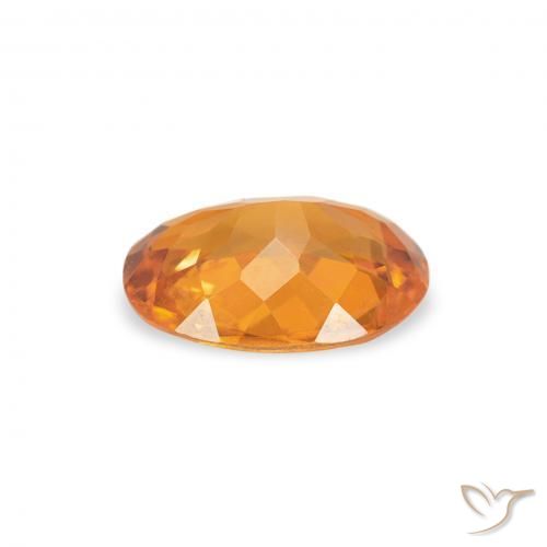 Clinoumite Albicocca Arancia naturale da 0.70 ct, Ovale, SI