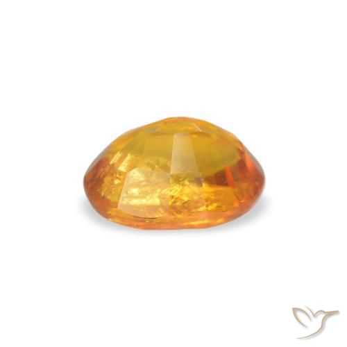 Clinoumite Arancio Medio naturale da 0.66 ct, Ovale, SI