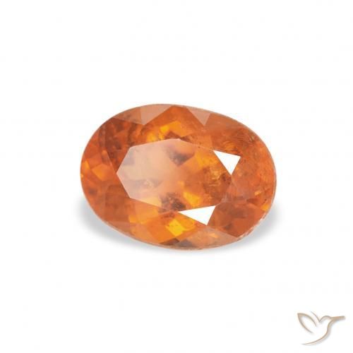 Clinoumite Arancione scuro naturale da 0.87 ct, Ovale, SI
