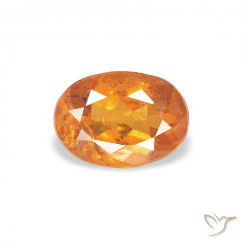 0.76ct Naturale Arancione rossastra Clinoumite, Ovale, SI