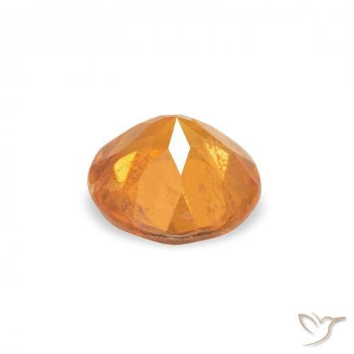 Clinoumite Arancio Medio naturale da 0.87 ct, Rotondo, SI