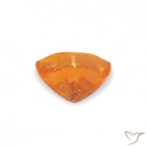 Clinoumite Arancia Albicocca tiepida Warm naturale da 0.61 ct, Taglio trillion, SI