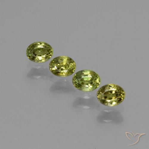 Gemme di Granato demantoide Verde giallastro naturale da 0.95 ct, Ovale, VS
