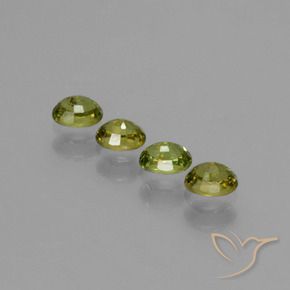 Gemme di Granato demantoide Verde giallastro naturale da 0.95 ct, Ovale, VS
