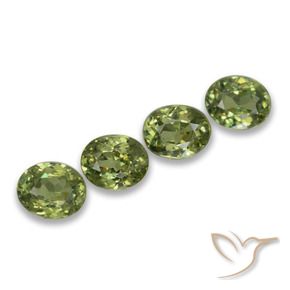 Gemme di Granato demantoide Verde foresta chiaro naturale da 1.57 ct, Ovale, VS