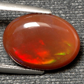 Opale di fuoco naturale multicolore da 6,21 ct, taglio ovale, traslucido