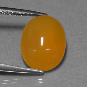 Opale di fuoco naturale arancione da 3,93 ct, taglio ovale, traslucido