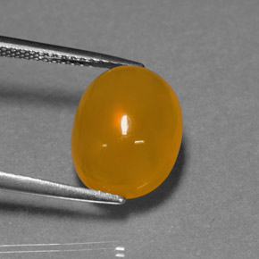 Opale di fuoco naturale arancione da 4,76 ct, taglio ovale, traslucido
