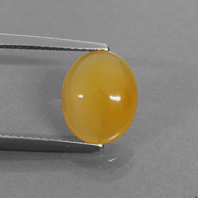 Opale di fuoco naturale arancione da 1,86 ct, taglio ovale, traslucido