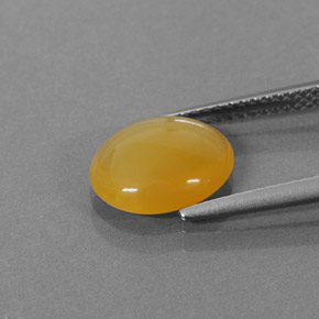 Opale di fuoco naturale arancione da 1,86 ct, taglio ovale, traslucido