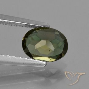 Rupin del grano Verde marroncino naturale da 0.75 ct, Ovale, VVS-VS