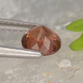 Granato malese rosa lampone naturale da 0.83 ct, Rotondo, VS