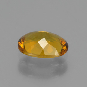 Piccolo Granato Oro verdastro naturale da 0.71 ct, Taglio ovale, VVS