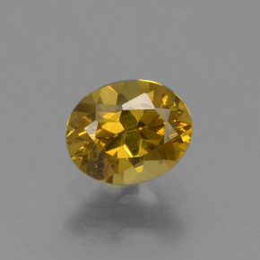 Piccolo Granato Oro verdastro naturale da 0.54 ct, Taglio ovale, VVS