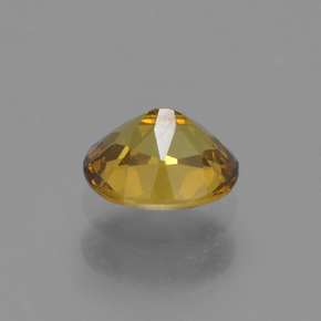 Piccolo Granato Oro verdastro naturale da 0.54 ct, Taglio ovale, VVS
