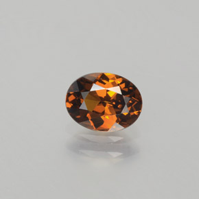 Piccolo Granato Bruno-arancio naturale da 0.87 ct, Taglio ovale, VVS