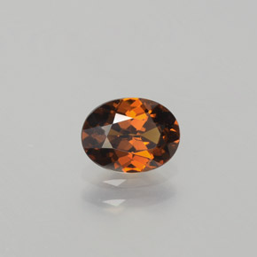 Piccolo Granato Bruno-arancio naturale da 0.87 ct, Taglio ovale, VVS