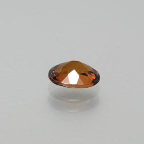 Piccolo Granato Bruno-arancio naturale da 0.87 ct, Taglio ovale, VVS
