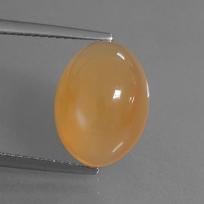 Pietra di luna naturale arancione da 6,14 ct, taglio ovale, traslucido