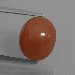 Pietra di luna naturale rosso da 6,02 ct, taglio ovale, traslucido