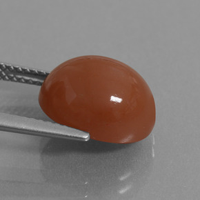 Pietra di luna naturale rosso da 6,02 ct, taglio ovale, traslucido