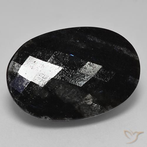 Nuummite Nero con scintillio blu naturale da 24.70 ct, Ovale, Opaco