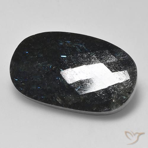 Nuummite Nero con scintillio blu naturale da 24.26 ct, Ovale, Opaco