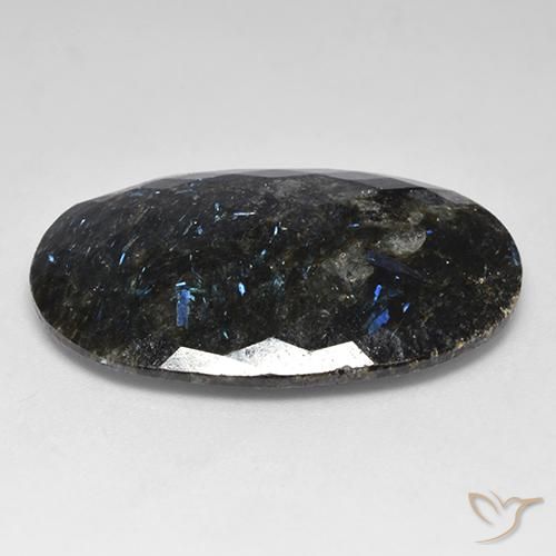 Nuummite Nero con scintillio blu naturale da 28.03 ct, Ovale, Opaco
