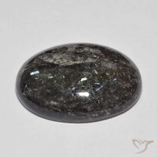 Nuummite Nero con scintillio blu naturale da 13.73 ct, Ovale, Opaco