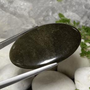 Ossidiana Nero lucido dorato naturale da 31.63 ct, Taglio ovale, Opaco