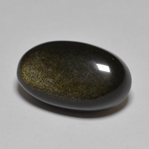 Ossidiana Nero con riflessi dorati naturale da 10.48 ct, Taglio ovale, Opaco