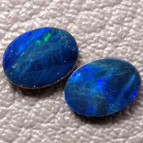 Doppietto di opale naturale multicolore da  ct, taglio ovale, opaco