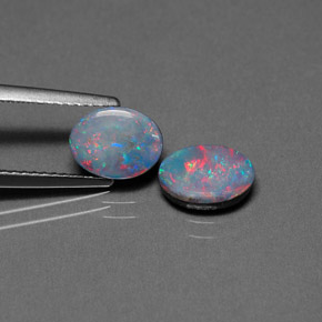Doppietto di opale naturale multicolore da  ct, taglio ovale, opaco