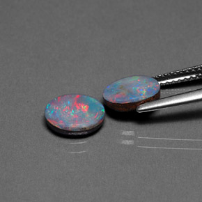 Doppietto di opale naturale multicolore da  ct, taglio ovale, opaco