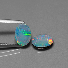 Doppietto di opale naturale multicolore da  ct, taglio ovale, opaco