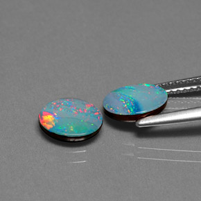 Doppietto di opale naturale multicolore da  ct, taglio ovale, opaco