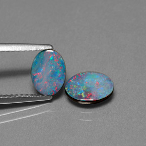 Doppietto di opale naturale multicolore da  ct, taglio ovale, opaco