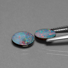 Doppietto di opale naturale multicolore da  ct, taglio ovale, opaco