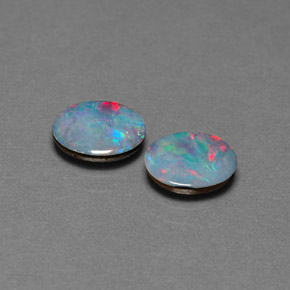 Doppietto di opale naturale multicolore da  ct, taglio ovale, opaco