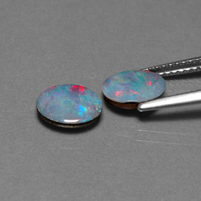 Doppietto di opale naturale multicolore da  ct, taglio ovale, opaco