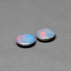 Doppietto di opale naturale multicolore da  ct, taglio ovale, opaco
