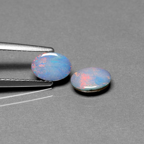 Doppietto di opale naturale multicolore da  ct, taglio ovale, opaco